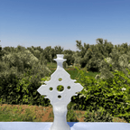 Handcrafted White Ceramic Sculpture with Geometric Cut-Out Design