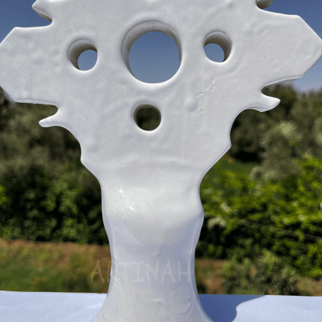 Handcrafted White Ceramic Sculpture with Geometric Cut-Out Design