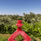 Handcrafted Red & Yellow Ceramic Sculpture with Diamond Cut-Out Design