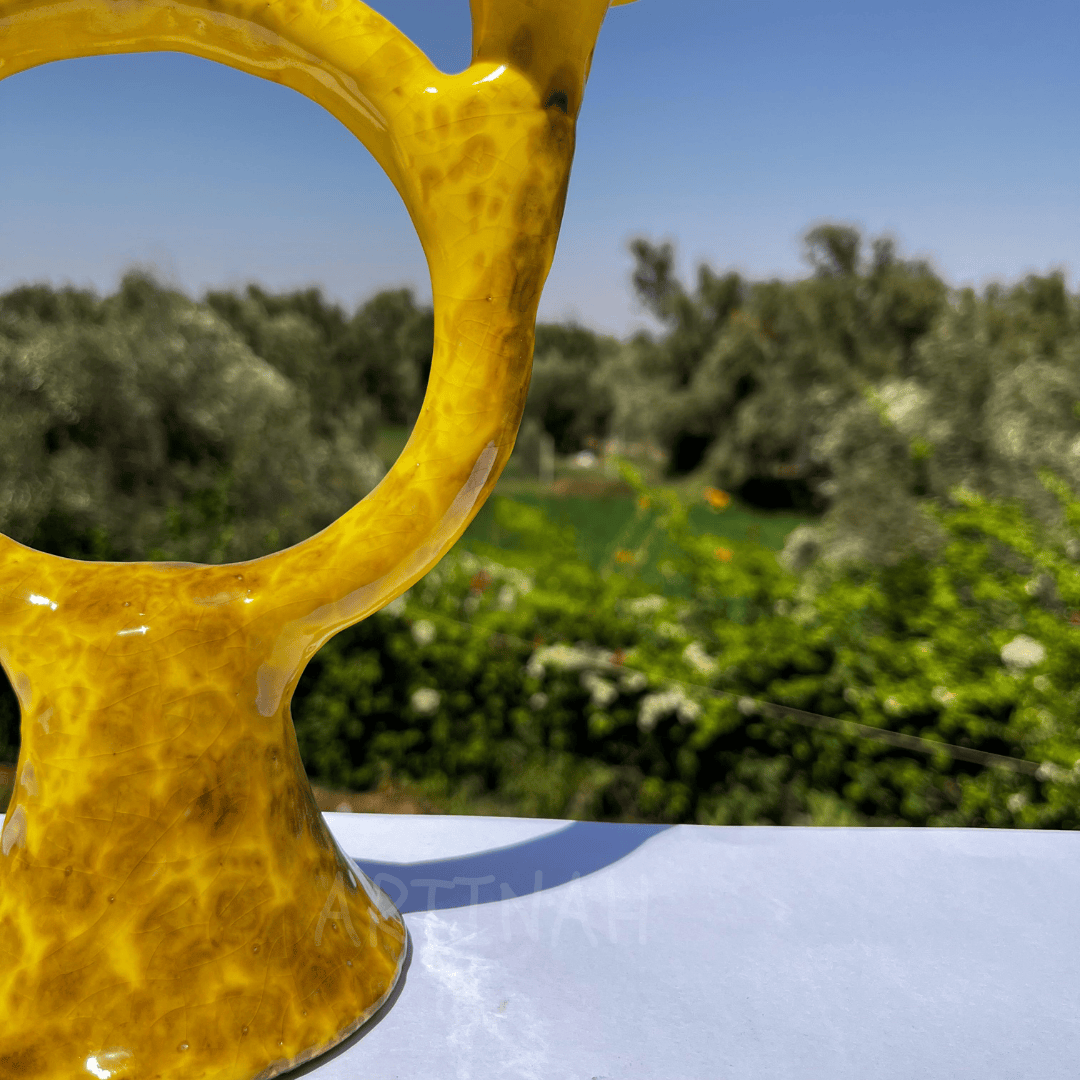 Handcrafted Yellow Ceramic Candle Holder with Open Circular Design