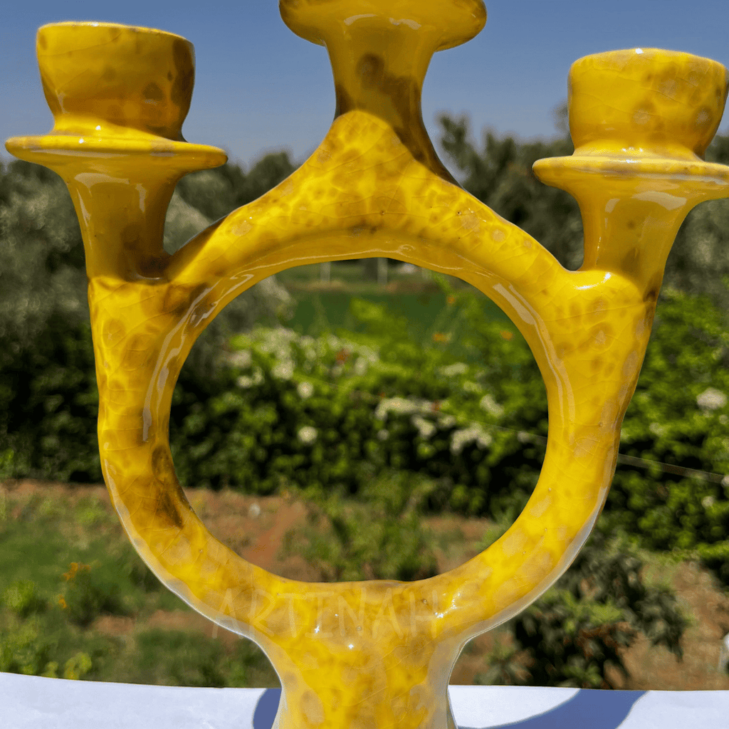 Handcrafted Yellow Ceramic Candle Holder with Open Circular Design