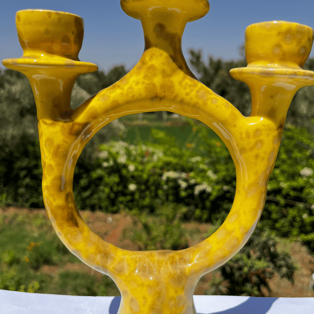 Handcrafted Yellow Ceramic Candle Holder with Open Circular Design