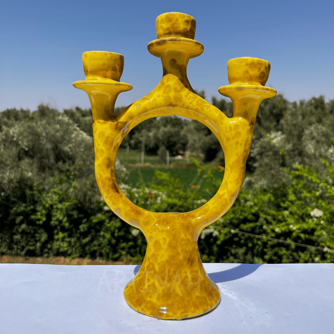 Handcrafted Yellow Ceramic Candle Holder with Open Circular Design