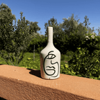 Handcrafted Ceramic Decorative Bottle – Abstract Face Design for Modern Home Decor