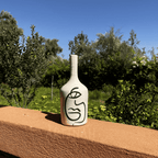 Handcrafted Ceramic Decorative Bottle – Abstract Face Design for Modern Home Decor