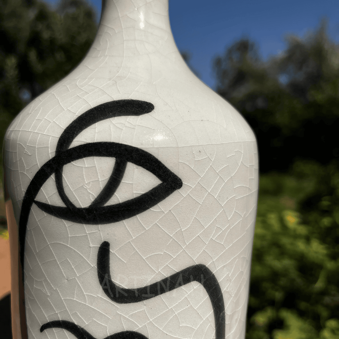 Handcrafted Ceramic Decorative Bottle – Abstract Face Design for Modern Home Decor