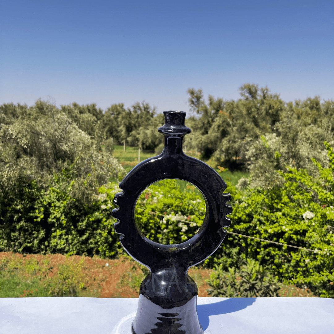 Handcrafted Black Ceramic Sculpture with Circular Design