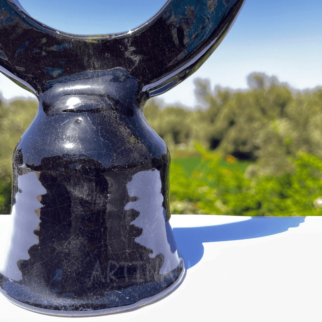 Handcrafted Black Ceramic Sculpture with Circular Design