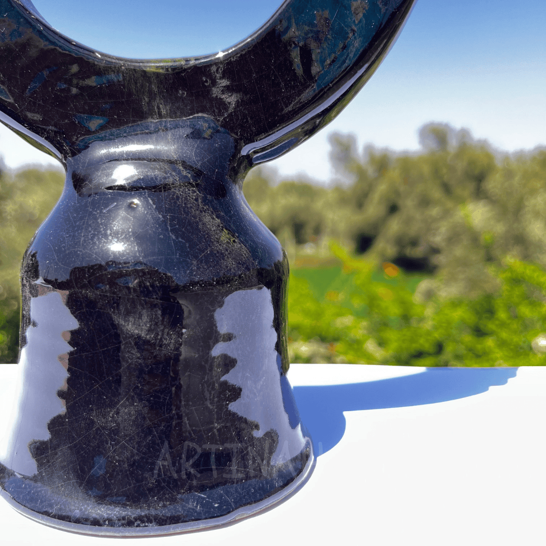 Handcrafted Black Ceramic Sculpture with Circular Design