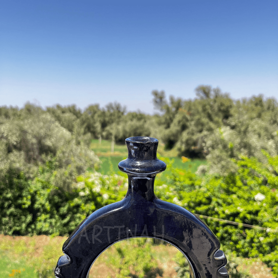 Handcrafted Black Ceramic Sculpture with Circular Design