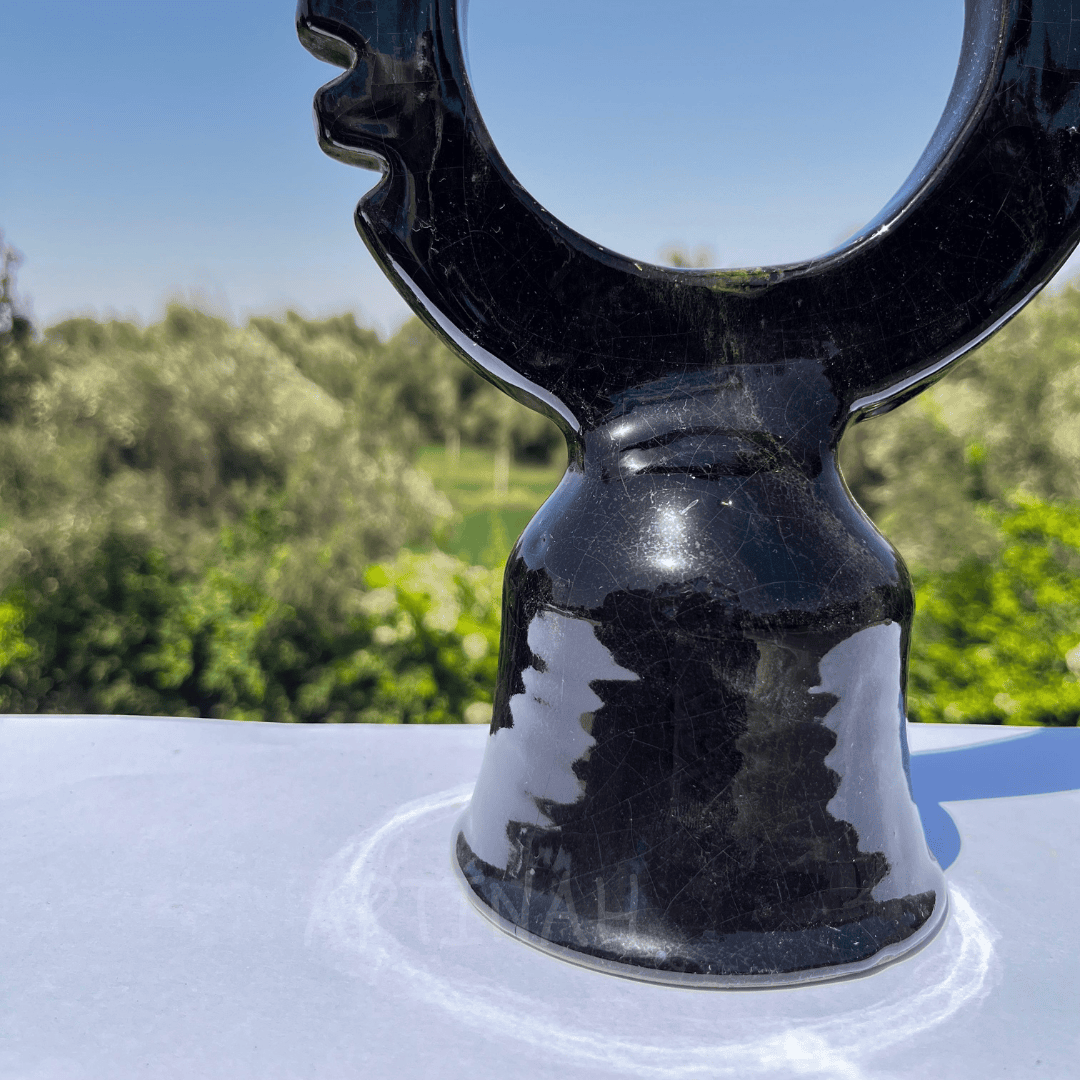 Handcrafted Black Ceramic Sculpture with Circular Design